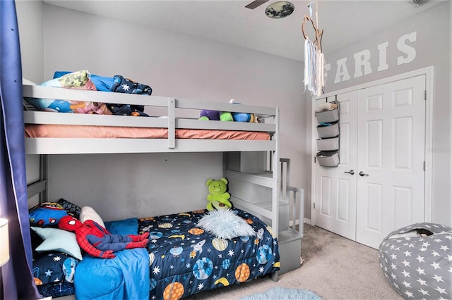 bedroom with a closet and carpet flooring