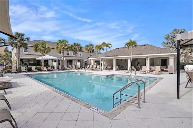 view of swimming pool with a patio area