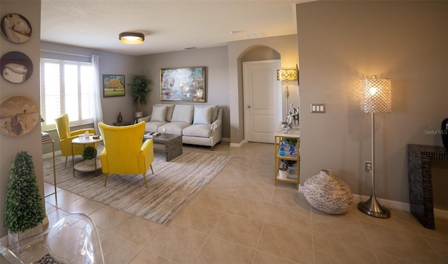 living room with light tile patterned floors