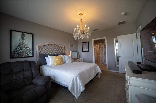 carpeted bedroom with an inviting chandelier