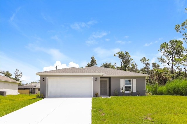 ranch-style home with a garage, a front yard, and central AC unit