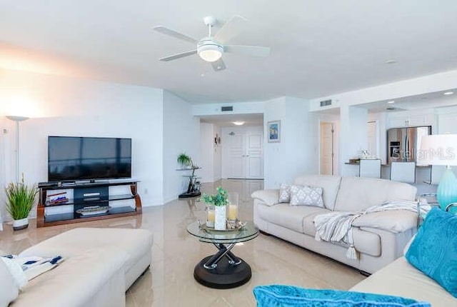 living room with ceiling fan