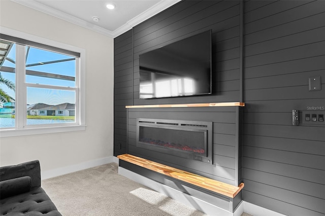 living room with crown molding and light colored carpet