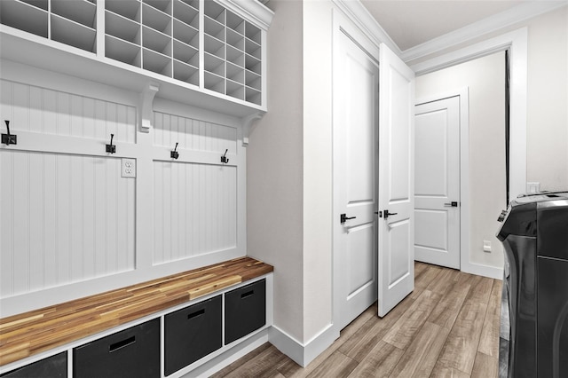 mudroom with washer / clothes dryer and light hardwood / wood-style floors