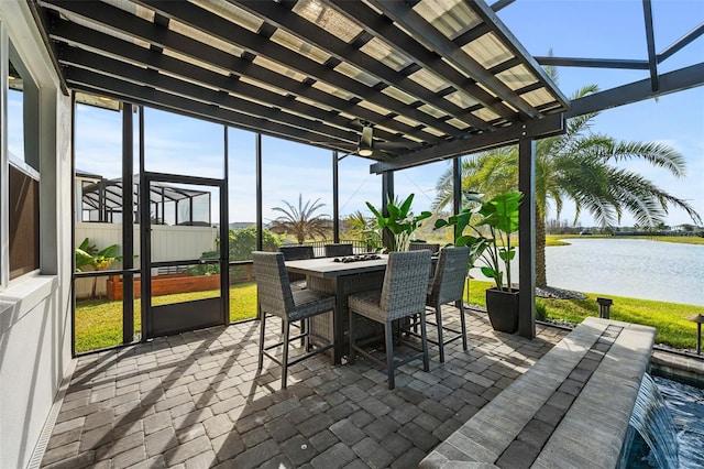 sunroom with a water view