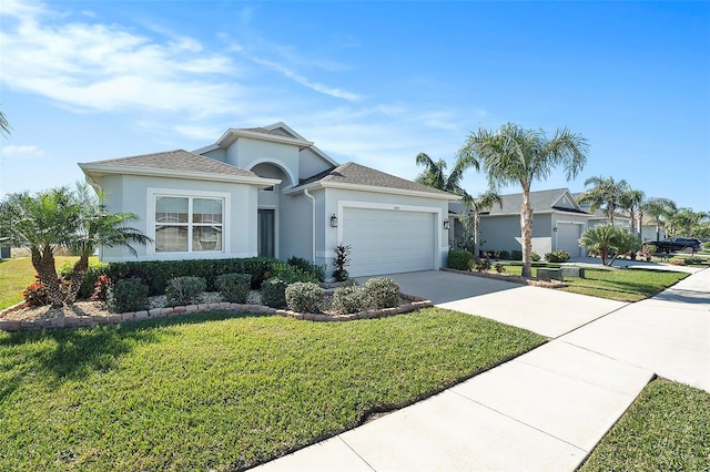 ranch-style house featuring stucco siding, a garage, concrete driveway, and a front yard