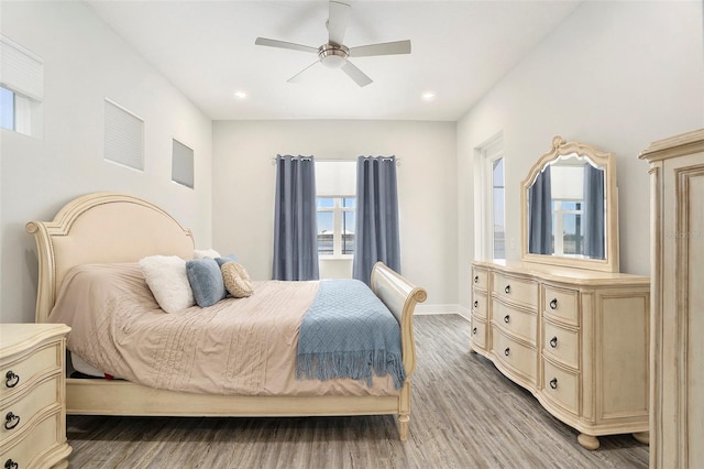 bedroom with recessed lighting, baseboards, light wood finished floors, and ceiling fan