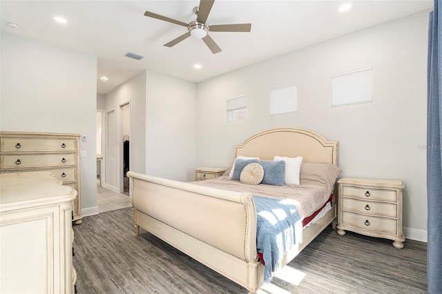 bedroom with visible vents, wood finished floors, recessed lighting, baseboards, and ceiling fan