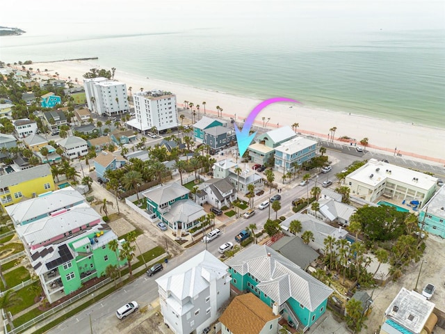 bird's eye view with a view of the beach and a water view