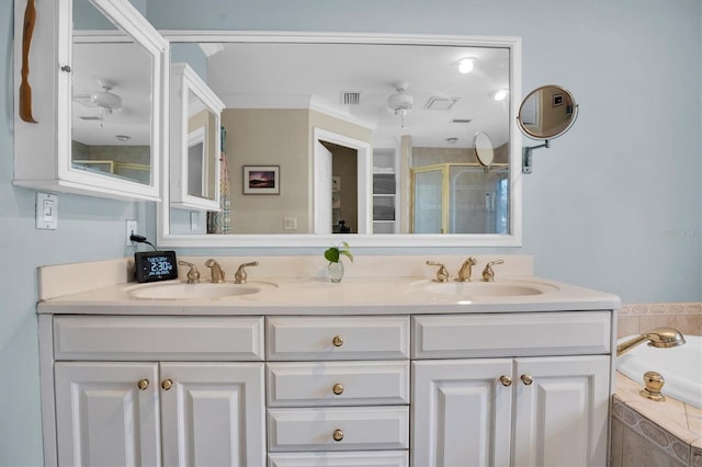 bathroom featuring independent shower and bath and vanity