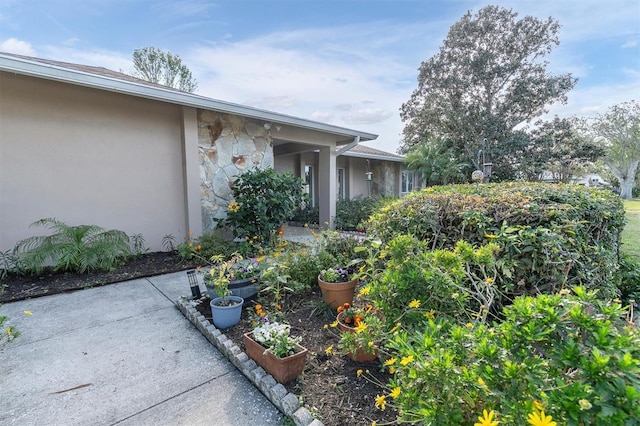 entrance to property featuring a patio area