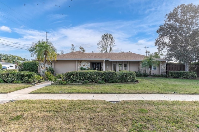 ranch-style house with a front yard