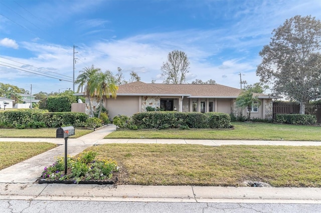 view of front of home with a front yard