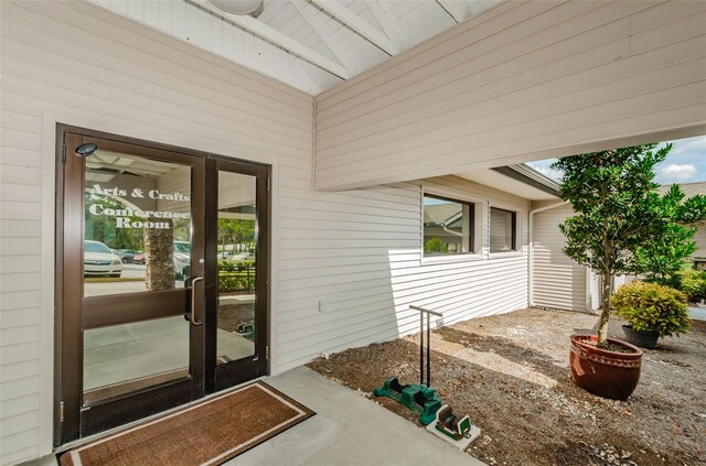 doorway to property with a patio and french doors