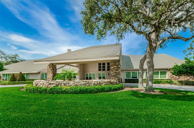 view of front of home with a front yard