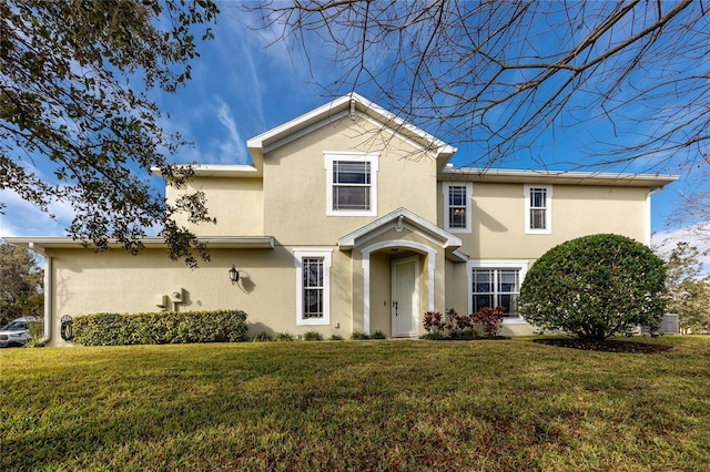 front facade featuring a front lawn