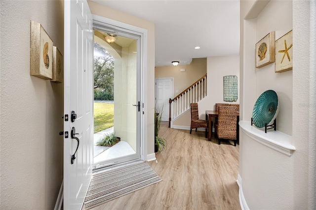 foyer entrance featuring light hardwood / wood-style floors