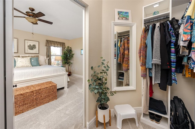 bedroom featuring light colored carpet