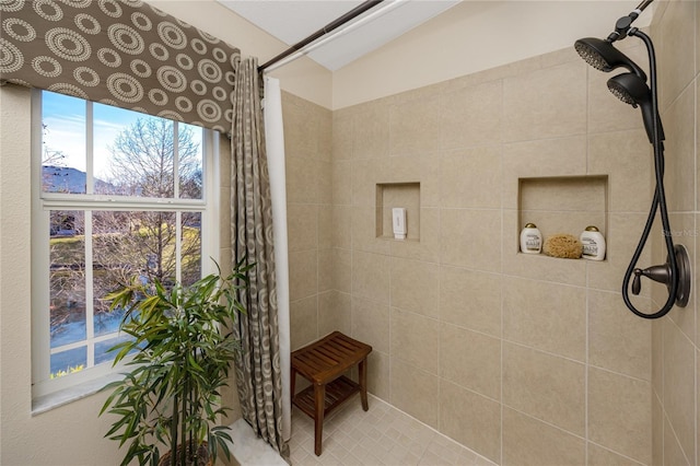 bathroom featuring a shower with curtain