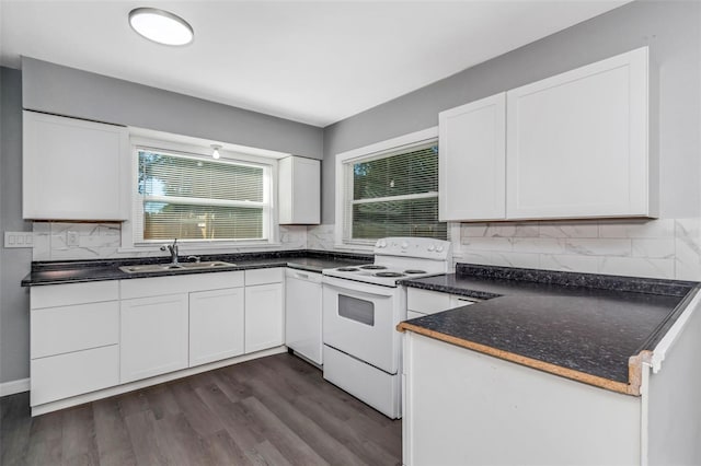 kitchen with sink, dark wood-type flooring, white cabinets, and white appliances