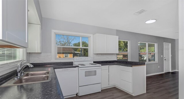 kitchen featuring white cabinetry, sink, white appliances, and dark wood-type flooring