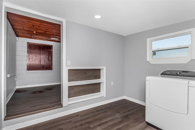 laundry area featuring washer / clothes dryer and dark hardwood / wood-style flooring