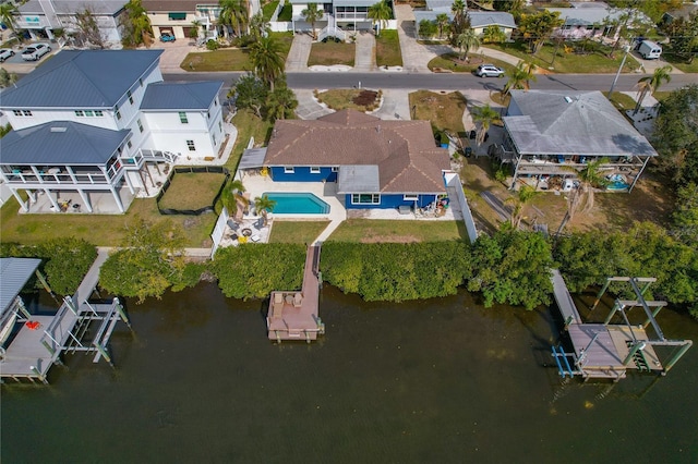 bird's eye view with a water view