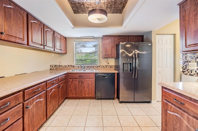 kitchen with sink, dishwasher, backsplash, stainless steel fridge with ice dispenser, and a raised ceiling