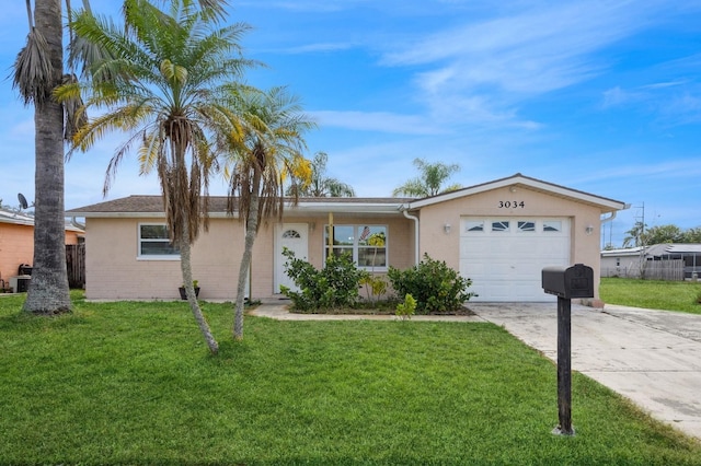 single story home with a garage and a front yard