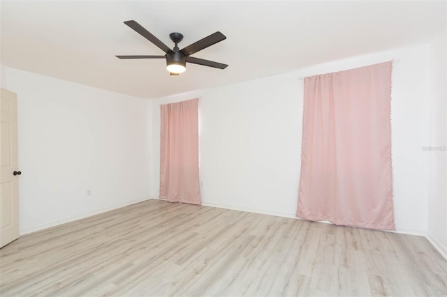 unfurnished room featuring ceiling fan and light hardwood / wood-style floors