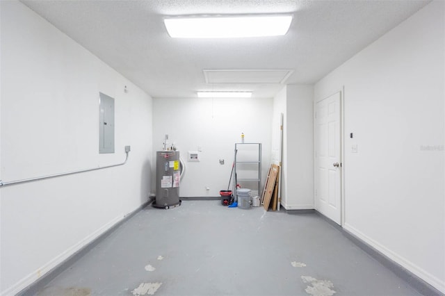 basement with electric panel, water heater, and a textured ceiling