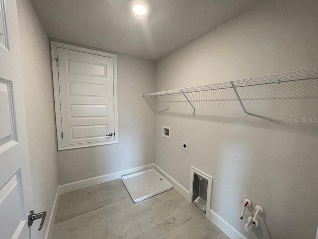 laundry area featuring hookup for a washing machine and hookup for an electric dryer