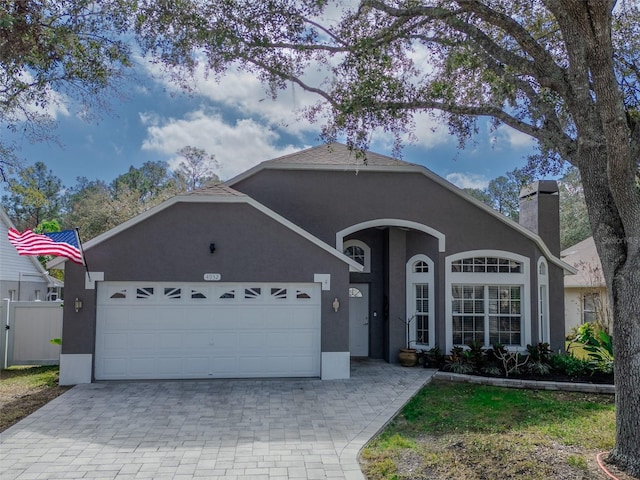 single story home with a garage