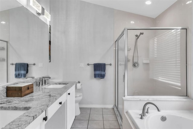 full bathroom with tile patterned floors, toilet, independent shower and bath, and vanity