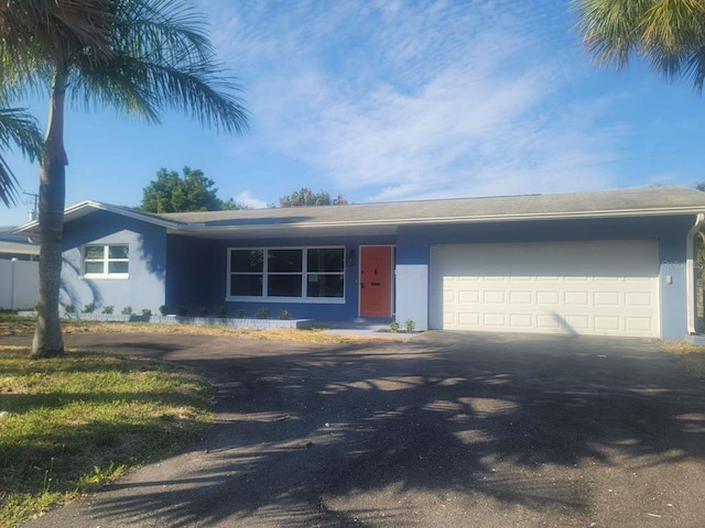 single story home with a garage