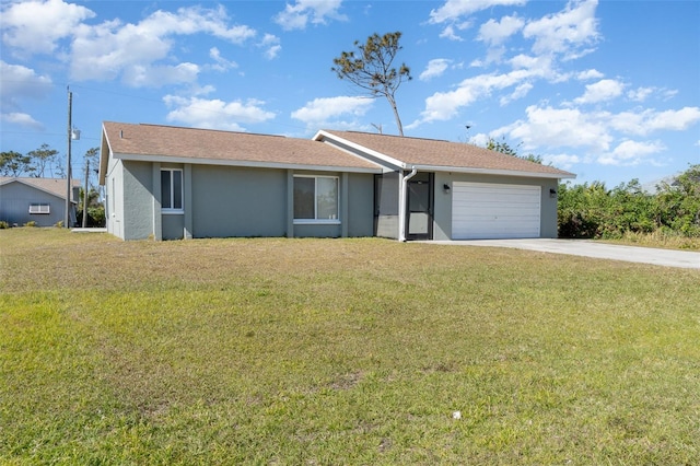 single story home with a garage and a front lawn