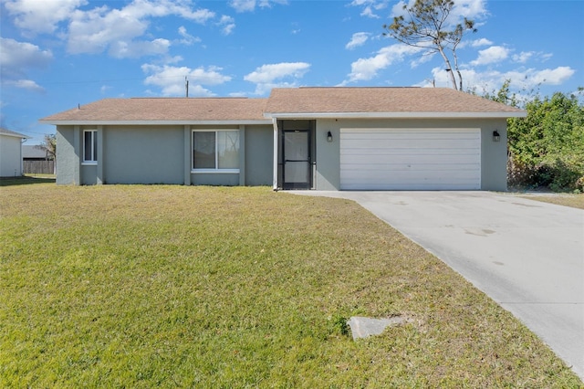 ranch-style house featuring a garage and a front yard