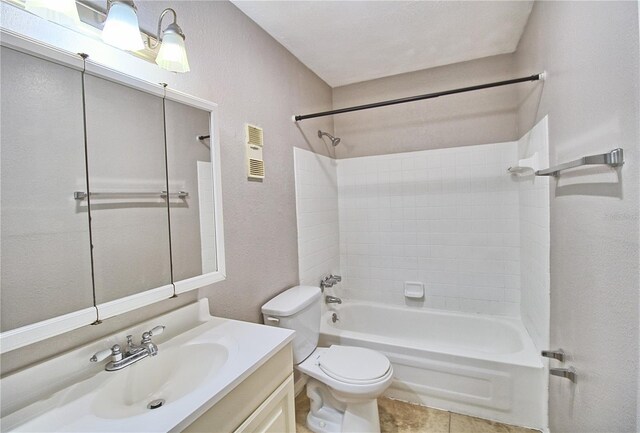 13760 Orange Sunset Dr Unit 201, Tampa, FL 33618 - full bathroom featuring vanity, tile patterned flooring, bathtub / shower combination, and toilet