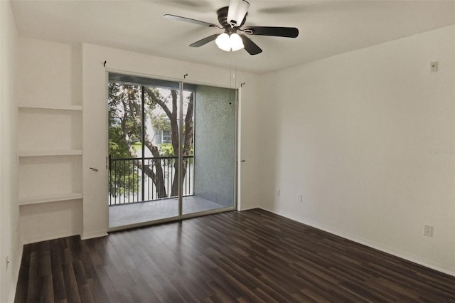 unfurnished room featuring dark hardwood / wood-style floors and ceiling fan