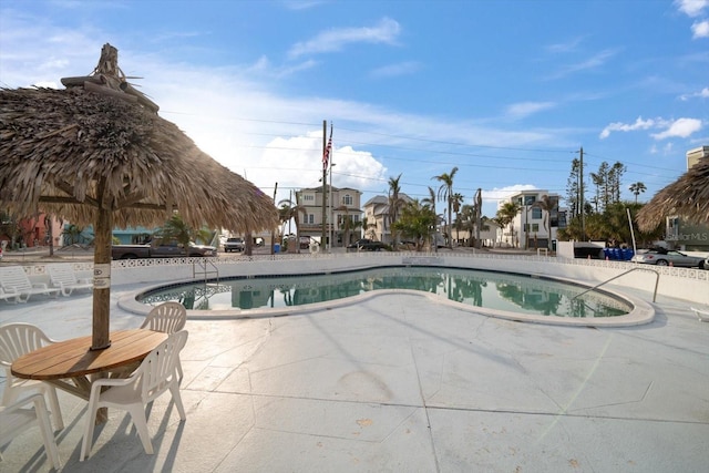 view of swimming pool with a patio area