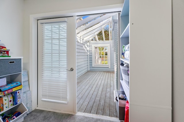 doorway with vaulted ceiling