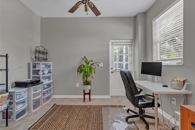 tiled home office with ceiling fan