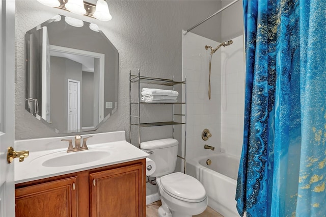 full bathroom featuring shower / bathtub combination with curtain, vanity, and toilet