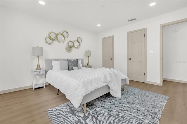 bedroom featuring light hardwood / wood-style flooring