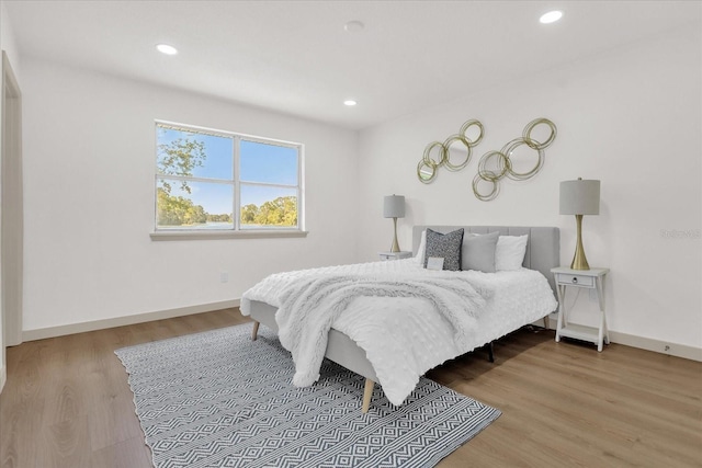 bedroom featuring light hardwood / wood-style floors