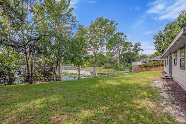 view of yard with a water view