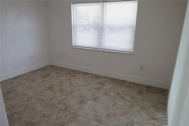 view of tiled empty room