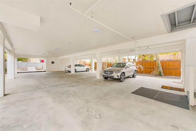 garage featuring a carport