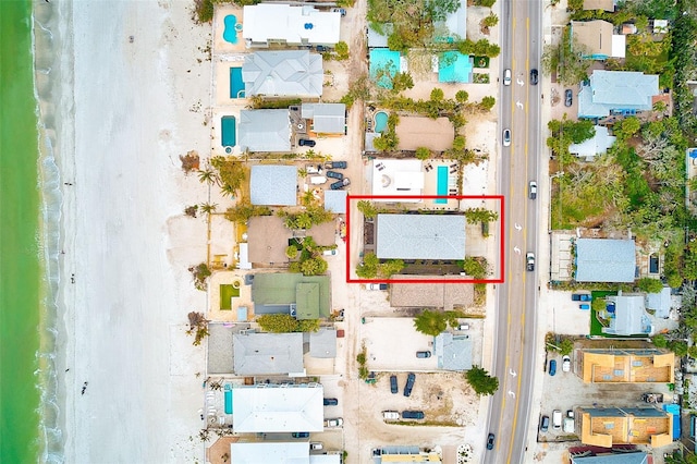 birds eye view of property featuring a residential view and a water view