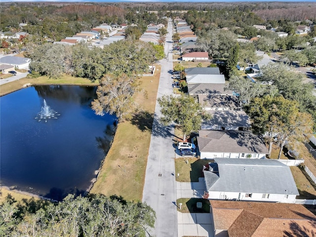 aerial view with a residential view and a water view